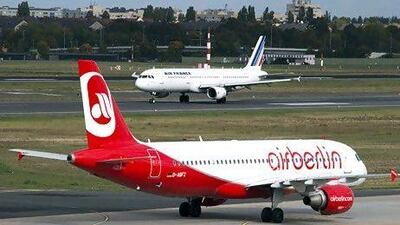 Air France-KLM and Air Berlin, in which Etihad Airways holds a 29.21 per cent stake, also announced a mutual code-share agreement. Thomas Peter / Reuters