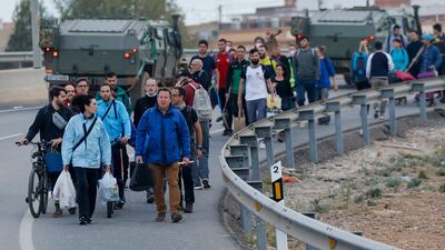 Volunteers head for Paiporta from Valencia city to join the cleaning and reconstruction works in the flooded areas, in Valencia, Spain, 03 November 2024. The number of volunteers going to the dana-affected villages to help with the clean-up has visibly decreased on 03 November. According to the Integrated Operational Coordination Center (CECOPI), more than 200 people have died in Valencia and neighboring provinces after floods caused by a DANA (high-altitude isolated depression) weather phenomenon hit the east of the country. According to Spain's national weather agency (AEMET), on 29 October 2024 Valencia received a year's worth of rain, causing flash floods that destroyed homes and swept away vehicles. EPA / BIEL ALINO