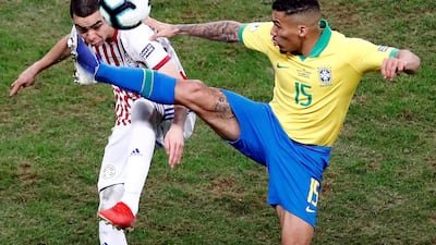 Paraguayan Miguel Almiron, left, vies for the ball with Brazilian Marques Allan. EPA