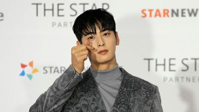 Cha Eun-woo, a member of K-Pop group ASTRO, poses for photos on the red carpet for the 2021 Asia Artist Awards in Seoul, South Korea, Thursday, Dec. 2, 2021. (AP Photo / Lee Jin-man)