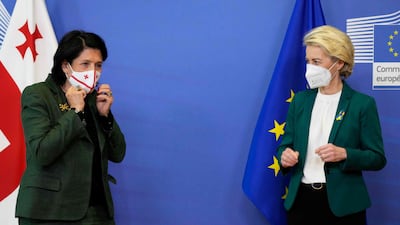 European Commission President Ursula von der Leyen (R) stands next to Georgia’s President Salome Zourabichvili prior to a meeting at EU headquarters in Brussels earlier this month. AFP.