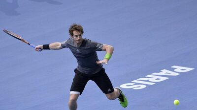 Britain's Andy Murray returns a shot to Julien Benneteau during his win at the Paris Masters on Wednesday. Miguel Medina / AFP / October 29, 2014