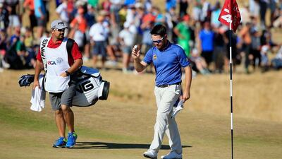 Louis Oosthuizen of South Africa celebrates an eagle on the 14th hole during the final round of the US Open on Sunday. He finished tied for second at 4-under. David Cannon / Getty Images / AFP