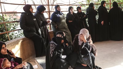 Displaced Palestinians mourn at the funeral of those killed in an overnight Israeli strike, in Khan Younis, Gaza, on February 15. AFP