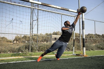 Abd Al Majid Abu Milak, 25, is the team's other goalkeeper. He lost his right hand in 2009 when he found an explosive device and took it home and tried to open it. Heidi Levine for The National
