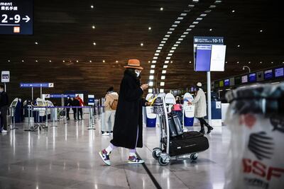 A passenger cat Charles de Gaulle Airport, where expansion plan shave been dropped amid a fall in traveller numbers due to the Covid pandemic. EPA