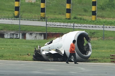 One engine sheared off when the Xiamen Air plane skidded off the runway at Manila airport. AFP