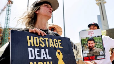 Relatives of Israeli hostages held in Gaza and supporters protest outside Defence Ministry in Tel Aviv. AFP