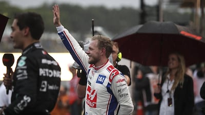 Kevin Magnussen celebrates his pole position for the sprint Brazilian Grand Prix. EPA