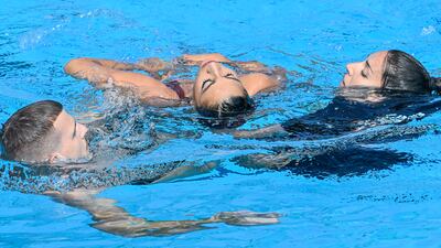 Anita Alvarez is helped from the pool after collapsing during the artistic swimming event at the World Aquatics Championships. AP