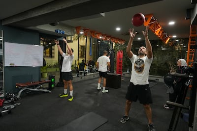 Members of Syria’s first Hyrox community take part in a training session.