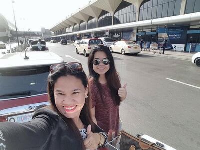 Marianne Bagui (R) with her mother Vilma. Pictured outside Dubai airport prior to the coronavirus outbreak. Vilma Bagui