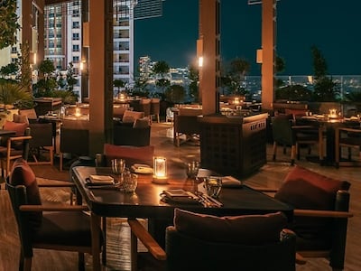 Hanu has indoor and outdoor seating, with tables at the former benefitting from built-in BBQ grills. Photo: Hanu