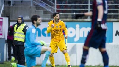 Luis Suarez celebrates after scoring Barcelona’s fourth goal. Juan Manuel Serrano Arce / Getty Images