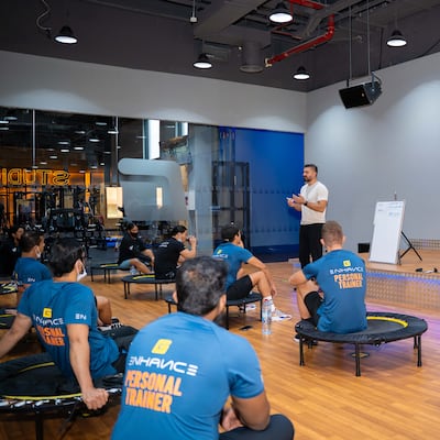 Tarek Mounir, CEO of Enhance Fitness, speaks to his team. Photo: Enhance Fitness