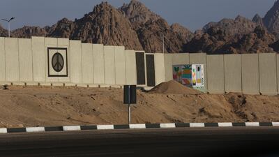 A peace sign adorns a concrete barrier that surrounds parts of the city of Sharm el-Sheikh, South Sinai, Egypt. When world leaders, diplomats, campaigners and scientists descend on Sharm el-Sheikh in Egypt for talks on tackling climate change, don't expect them to part the Red Sea or perform other miracles that would make huge steps in curbing global warming. AP Photo