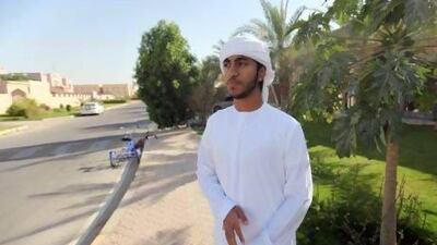Abdul Aziz, 20, a resident of Mohammed Bin Zayed City in Abu Dhabi complains about a lack of amenities. (Sammy Dallal / The National)