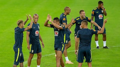 Neymar, left, and Miranda, second from left, attend Brazil's training session in Jeddah, Saudi Arabia, on Monday. EPA