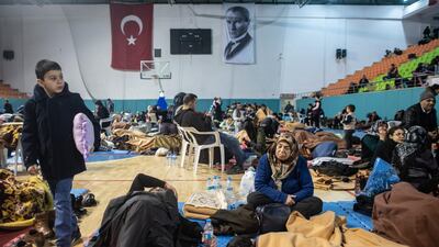 Earthquake survivors spend the night in a sports hall in Elazig, Turkey. Getty Images