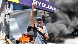 Protesters lit fires and smashed glass doors during a demonstration over Lebanon's banking crisis in Beirut. EPA