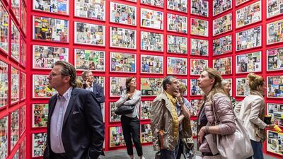Visitors take in the scene at Art Basel. Courtesy of Art Basel