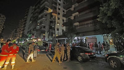 Lebanese Army investigators outside a building where clashes erupted between Lebanese troops and a former member of ISIS, who had engaged in an hours-long shootout with the security forces, in Tripoli, Lebanon, Tuesday, June 4, 2019. AP