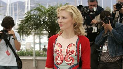 Cate Blanchett, in an embroidered midi, attends a photocall for 'Babel' at the Palais des Festivals during the Cannes Film Festival on May 23, 2006 in Cannes, France. Getty Images