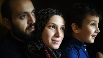 Wael, Reem and Ali pose for a portrait inside the room of the basement at the community centre of the Kreuzkirche where they now live in Hamburg, Germany. Wael arrived in Germany on his own eight months ago and lived for the first five months in a shelter for migrants in Hamburg’s Wilhelmsburg island district. German authorities initially sought to deport him to Spain after they found out that was where he first entered the European Union. Astrid Riecken / Getty Images