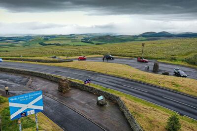 The border between Scotland and England, Carter Bar, Scotland. Jeff J Mitchell / Getty Images