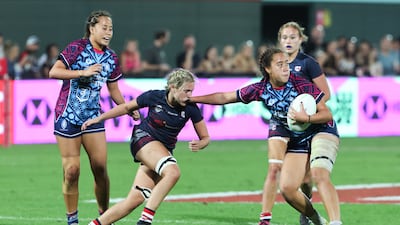 Dubai Warriors take on Dubai College during the Gulf Under-19 Girls final at the Emirates Dubai Sevens. Victor Besa / The National