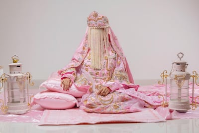 This pink outfit is worn by brides in the Madinah region. Hussain Haddad for The National.