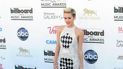 Miley Cyrus arrives at the 2013 Billboard Music Awards in Las Vega. David Becker / Getty Images / AFP