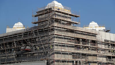 The facade of the temple takes shape. Pawan Singh / The National