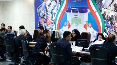 Iranians register their candidacy for Iran's upcoming presidential elections on 19 May at the interior ministry in Tehran. Abedin Taherkenareh / EPA