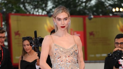Vanessa Kirby, in gold Valentino haute couture, arrives for the premiere of 'The Son' during the 79th annual Venice International Film Festival on September 7, 2022. EPA