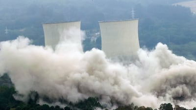 General view of the demolition of the cooling towers of Endesa's thermal power plant near A Coruna, Spain. EPA