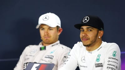 Chinese Grand Prix winner Lewis Hamilton, right, of Mercedes GP speaks to the media with teammate Nico Rosberg, who finished second, at the Shanghai International Circuit on April 12, 2015 in Shanghai, China. Mark Thompson/Getty Images