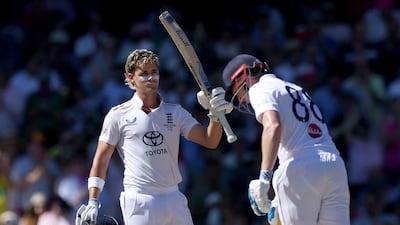 England’s Jacob Bethell celebrates after reaching his century on day four of the fifth Ashes Test in Sydney. AFP