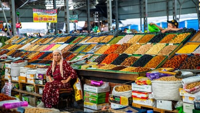 A woman sells dry fruit and nuts in Bishkek's Osh Bazaar. All photos: Getty Images