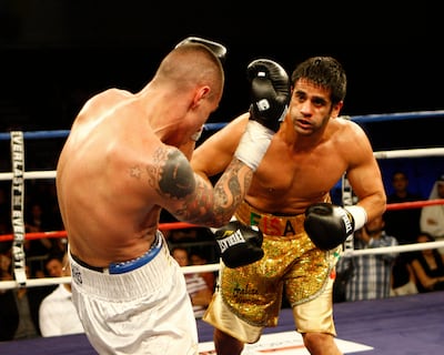 Eisa Al Dah, right, on his way to victory over Ignasi Caballero Perez in Dubai in 2011. Mike Young / The National