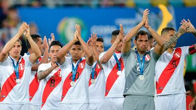 Peru's players acknowledge the crowd. AFP