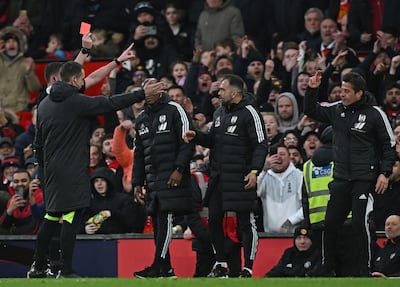 Fulham's Portuguese head coach Marco Silva, right, is shown a red card by referee Chris Kavanagh. AFP