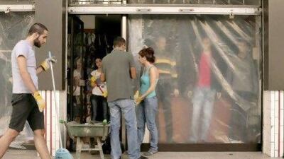 Many shops and businesses have been forced to close due to damage suffered during the recent bomb blast in the Lebanese capital. Maya Alleruzzo / AP Photo