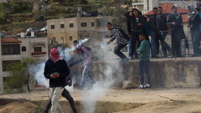 Amnesty International says that 22 Palestinians were killed by Israeli troops last year in clashes similair to this one in the West Bank town of Birzeit, north of Ramallah, on Thursday. Atef Safadi / EPA