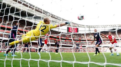 David Luiz's header sails into the net to earn Arsenal a nervy 1-0 win over Bournemouth. Reuters