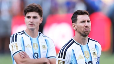 Lionel Messi, right, looks dejected after defeat to Spain in the Woeld Cup final. AFP