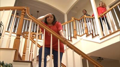 Jo Frost with members of a family she is trying to help in Family SOS on TLC HD. Courtesy TLC / March 2014