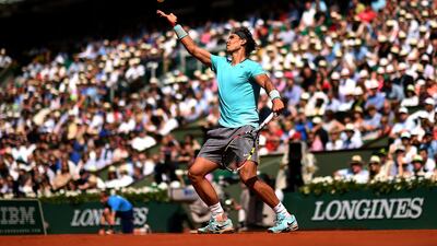 Rafael Nadal of Spain serves during his men's singles match against Leonardo Mayer of Argentina at the French Open on May 31, 2014. Matthias Hangst / Getty Images