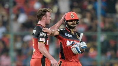 AB De Villiers, left, and Virat Kohli, have produced a remarkable partnership during this IPL season. Manjunath Kiran / AFP