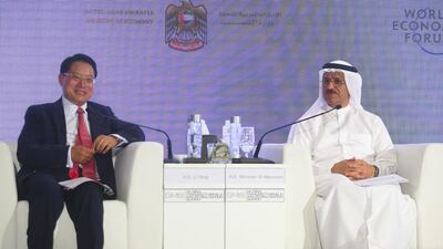 Sultan Al Mansouri, the Minister of Economy, right, and Li Yong, the director general of Unido, yesterday during the announcement of global manufacturing summit next year. Lee Hoagland / The National